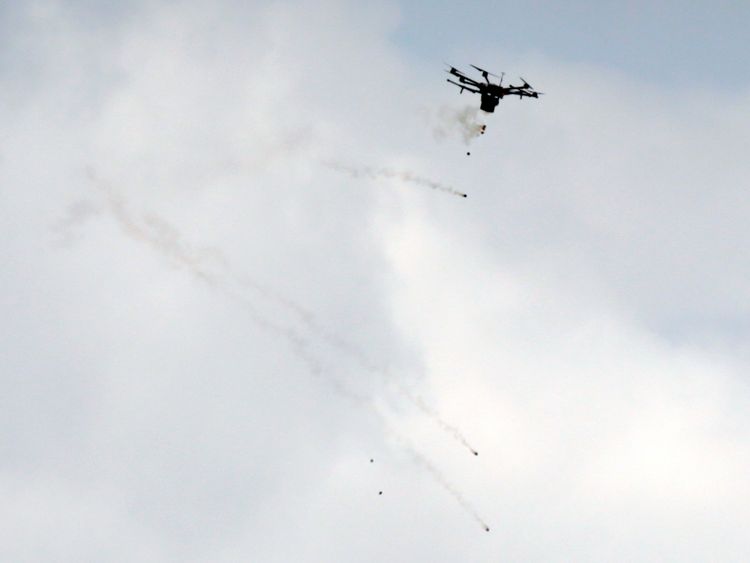 Israeli drone dropping tear gas grenades during clashes with Palestinian protesters at a tent city protest