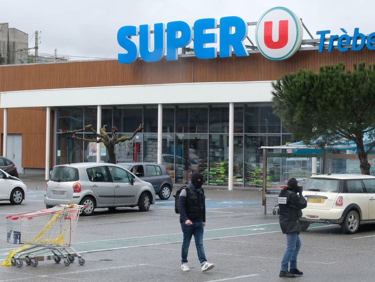 Forensics work in front of the Super U supermarket in Trebes, southwestern France