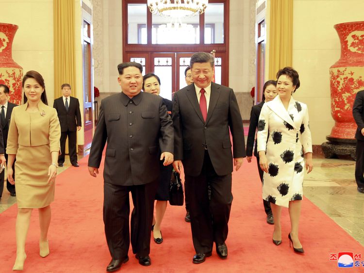 Ri Sol Ju wore a camel-coloured skirt suit to the welcome ceremony in Beijing