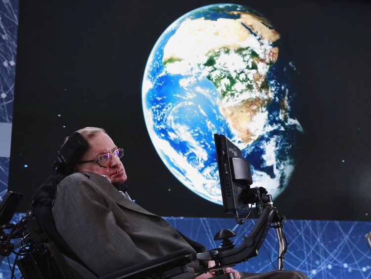 Stephen Hawking sits on stage during an announcement of the Breakthrough Starshot initiative with investor Yuri Milner in New York April 12, 2016