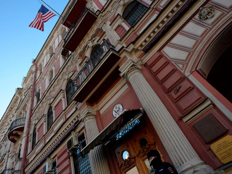 A Russian police officer stands guard outside the US Consulate in St Petersburg