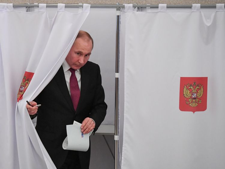 Vladimir Putin at polling station