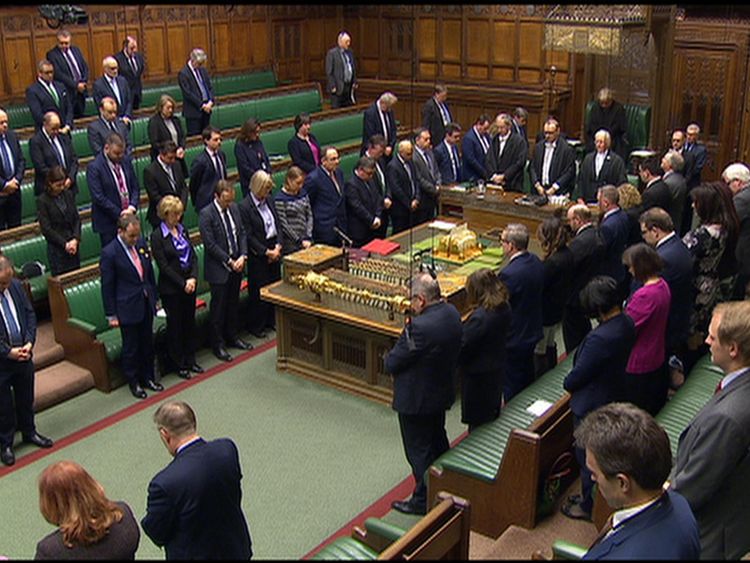 MPs bow their head for a minute's silence to mark the victims