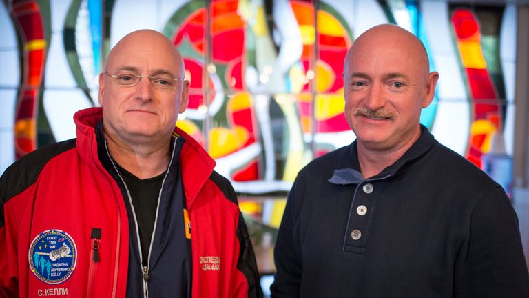 Astronaut Scott Kelly (L) and his twin mark