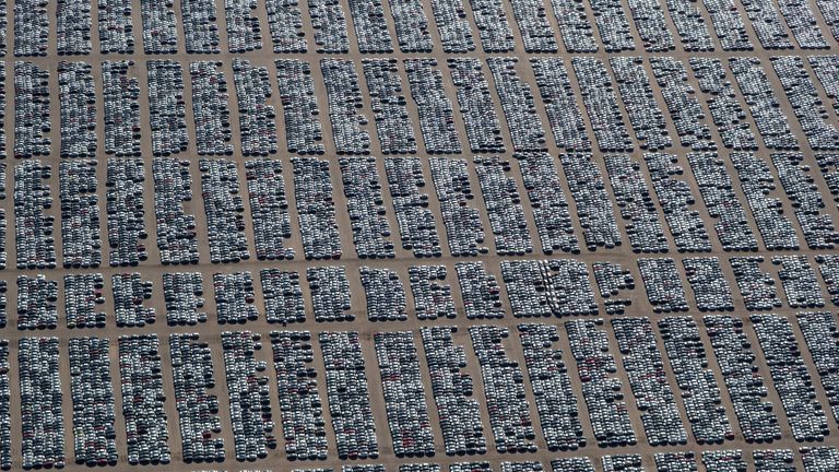 At this distance, it is not immediately obvious that the pattern is made by discarded cars 