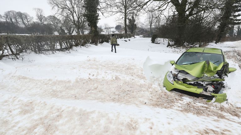An abandoned car at Belah bridge in Cumbria as the cold weather across the country continues.