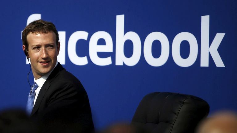 Facebook CEO Mark Zuckerberg is seen on stage during a town hall at Facebook&#39;s headquarters in Menlo Park, California September 27, 2015