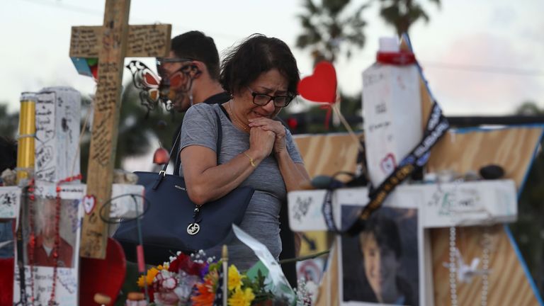 Mourners grieve after the Florida school shooting