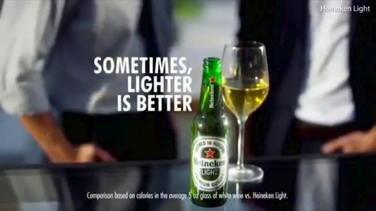 The &#39;lighter is better&#39; advert has sparked outrage online. Pic: Heineken