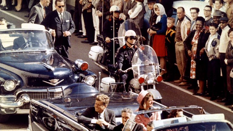 John F. Kennedy rides through Dallas moments before he was assassinated, November 22, 1963