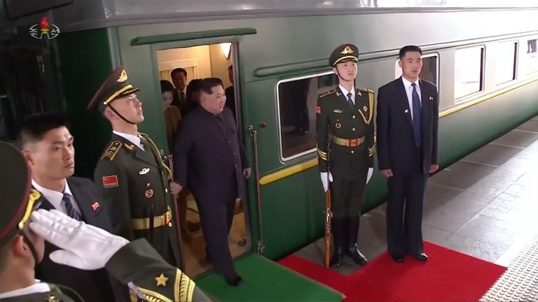 Kim Jong Un disembarked the green train in Beijing using a ramp