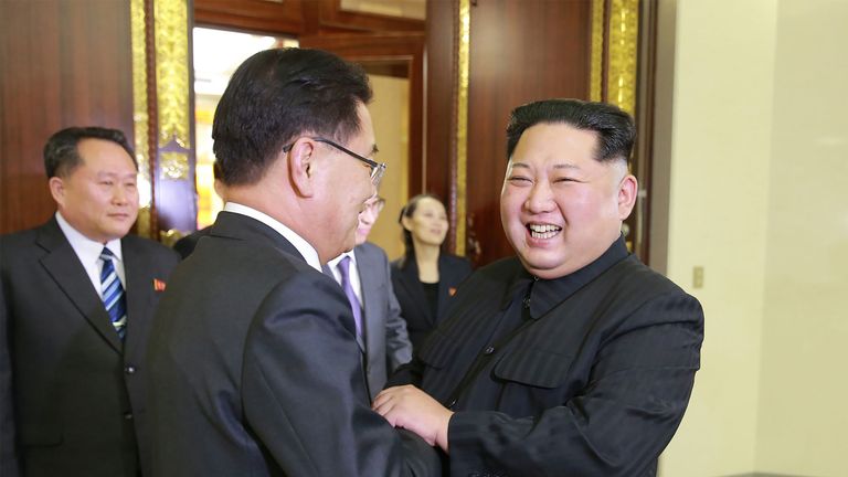 Kim Jong Un was pictured enthusiastically greeting the South&#39;s Chung Eui-yong