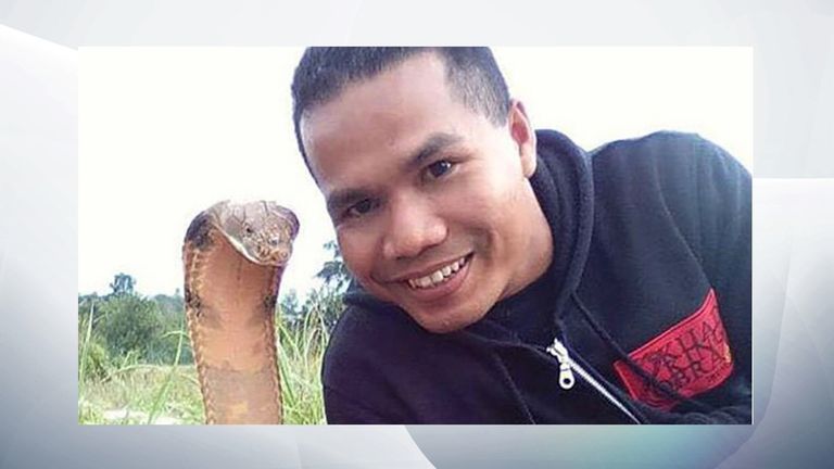 Abu Zarin Hussin trained firefighters to catch snakes without harming them. Pic. Facebook