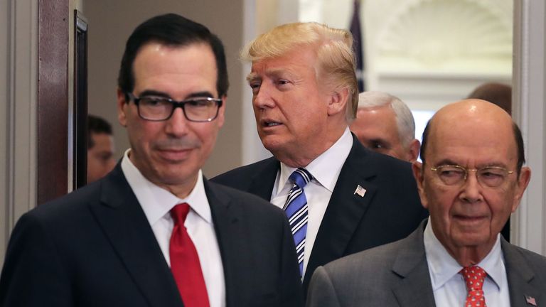 Steve Mnuchin (L) with President Trump and Commerce Secretary Wilbur Ross