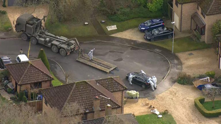 An army vehicle removes a car from the home of detective sergeant Nick Bailey 