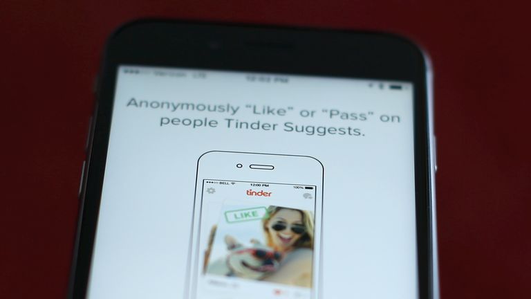 The dating app Tinder is shown on an Apple iPhone