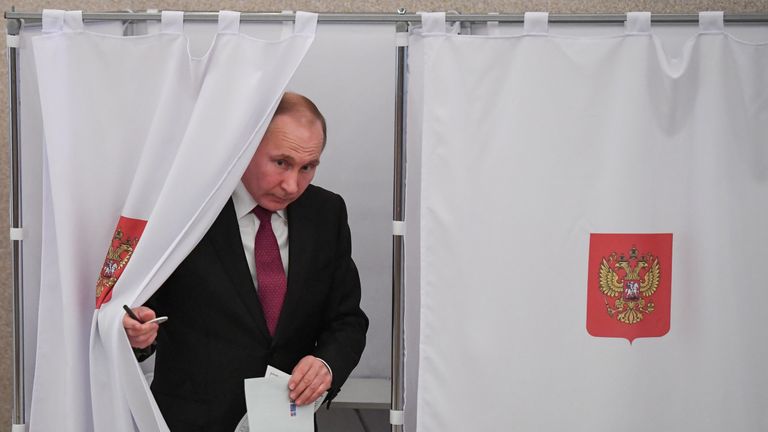 Vladimir Putin at polling station