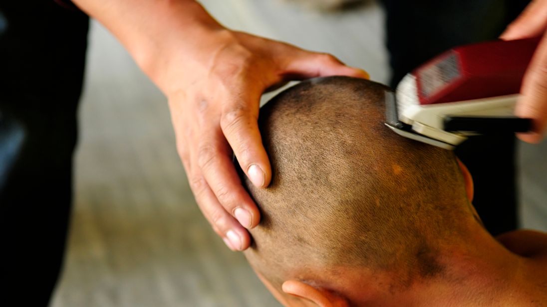 Abdulrahim Omar shaved the boys head to &#39;teach him a lesson&#39; for playing with a shaver