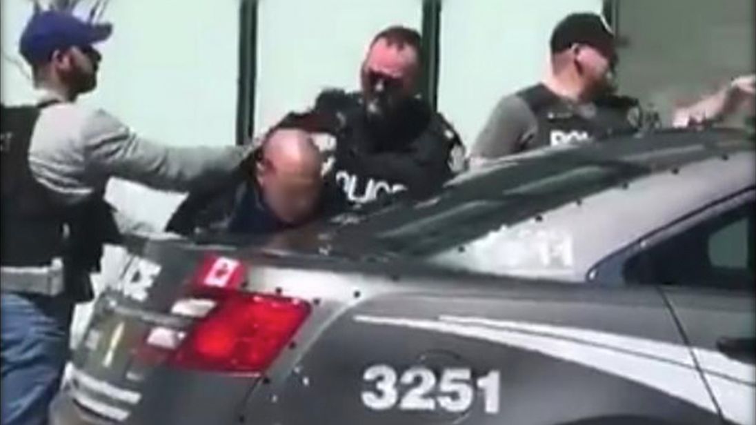 Footage from a passer-by appears to show police apprehending the suspected attacker. Credit: Diego DeMatos