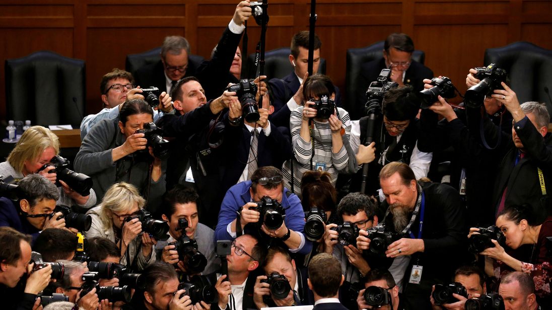 Facebook CEO Mark Zuckerberg is surrounded by members of the media as he arrives to testify before a Senate Judiciary and Commerce Committees joint hearing regarding the companys use and protection of user data, on Capitol Hill in Washington, U.S., April 10, 2018. REUTERS/Leah Millis