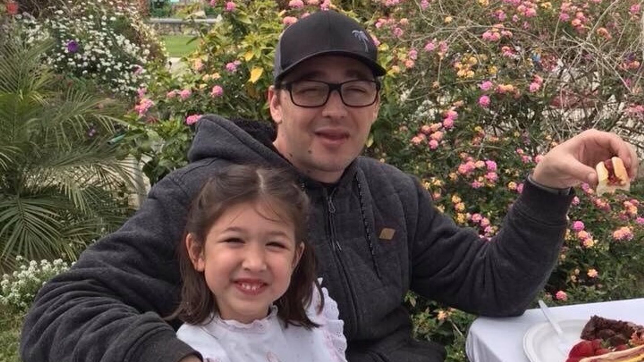 Father fatally stabbed while daughter sat on his lap at California