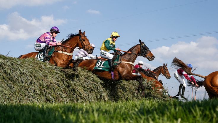 LIVERPOOL, ENGLAND - APRIL 14:  Bryony Frost riding Milansbar (C, yellow/green) on their way to finishing in 5th place in The Randox Health Grand National Handicap Steeple Chase at Aintree racecourse on April 14, 2018 in Liverpool, England. (Photo by Alan Crowhurst/Getty Images) *** Local Caption *** Bryony Frost;Milansbar