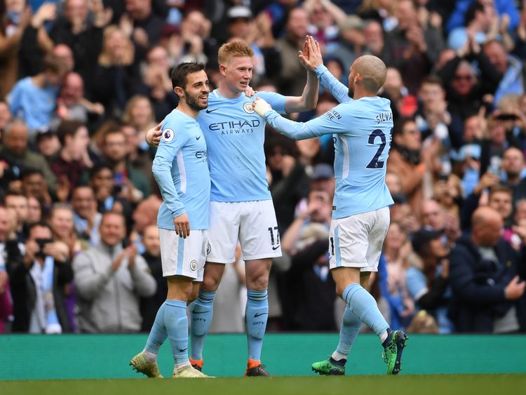 Kevin De Bruyne is congratulated after his sensational strike puts Man City 3-0 ahead