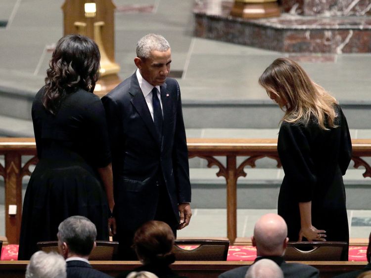 Former President Barack Obama and former first lady Michelle Obama greet first lady Melania Trump at St. Martin's Episcopal Church for a funeral service for former first lady Barbara Bush, Saturday, April 21, 2018, in Houston