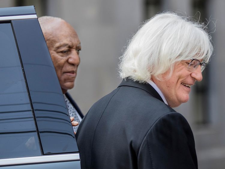 Bill Cosby (L), and his new attorney, Tom Meserau share a moment outside Montgomery County Courthouse in Norristown, Pennsylvania., U.S. August 22, 2017