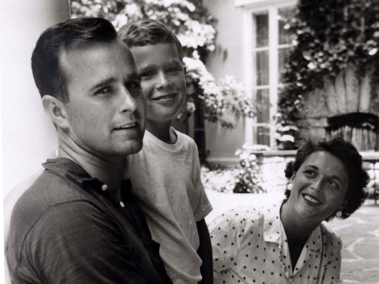 George W. Bush is shown with his father, future President George Bush and mother, future first lady Barbara Bush in Rye, New York, in this file photo taken during the summer of 1955