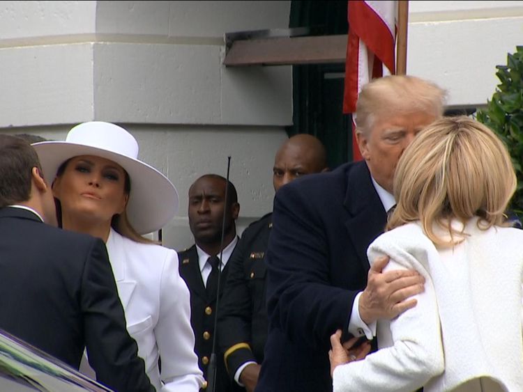 Donald and Melania Trump greet Emmanuel and Brigitte Macron