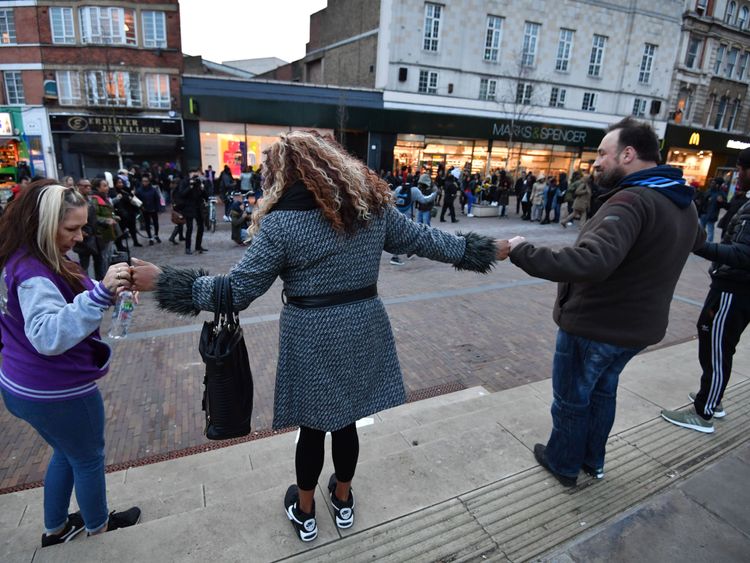 Members of the public took part in an anti-gang violence rally in Hackney