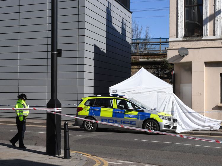 Police at the scene in Hackney, east London where a man in his 20s died after being stabbed