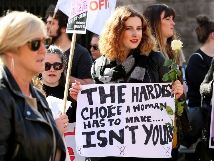 Protesters hold up placards as they take part in the March for Choice, calling for the legalising of abortion in Ireland after the referendum announcement, in Dublin on September 30, 2017. Tens of thousands are expected at a rally for abortion rights in Dublin on September 30, campaigning on one side of a fierce debate after Ireland announced it will hold a referendum on the issue next year. / AFP PHOTO / Paul FAITH (Photo credit should read PAUL FAITH/AFP/Getty Images)
