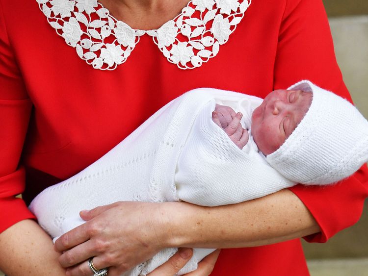 The new prince in his mother's arms outside the Lindo Wing