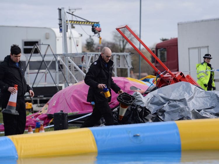 Police and forensic officers at the scene where seven-year-old Summer died