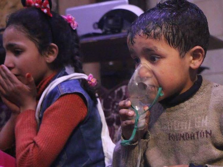 Children suffering the effects of a suspected gas attack in Douma. Pic: UOSSM