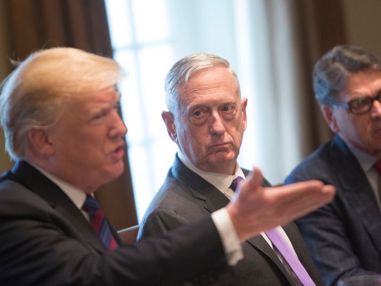 U.S. Defense Secretary James Mattis (C) and Energy Secretary Rick Perry (R) listen to President Donald Trump speak during a luncheon with the leaders of Estonia, Latvia and Lithuania on April 3, 2018 at The White House in Washington, DC. The President answered questions from the media about a wide range of issues including illegal immigration from Mexico and relations with Russia. (Photo by Chris Kleponis-Pool/Getty Images)