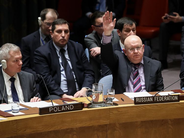 Russian Ambassador to the United Nations Vasily Nebenzya votes to veto a U.S. draft resolution to create a new inquiry to find blame for the chemical weapons attack last week in Douma,