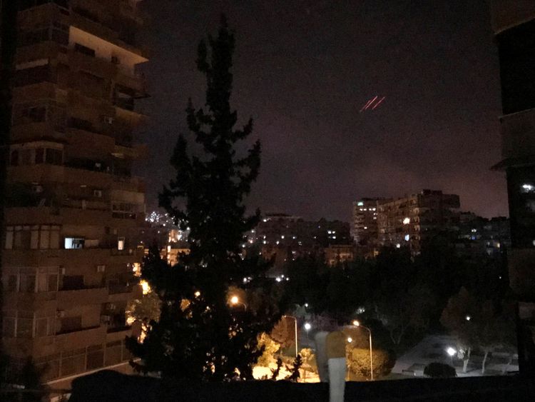 Anti-aircraft fire is seen over Damascus as the US, UK and France launch airstrikes