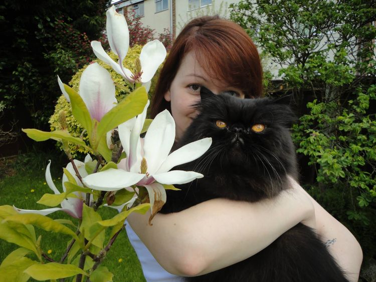 Ms Skripal pictured with one of her father's two cats - one has died and the other is missing. Pic: Facebook