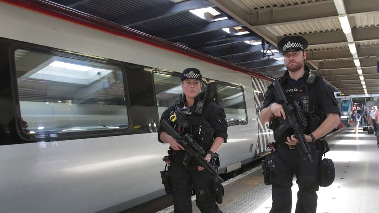 Armed police patrol transport hubs in London