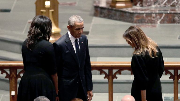 Former President Barack Obama and former first lady Michelle Obama greet first lady Melania Trump at St. Martin's Episcopal Church for a funeral service for former first lady Barbara Bush, Saturday, April 21, 2018, in Houston