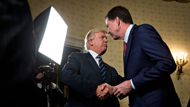 James Comey and Donald Trump shake hands