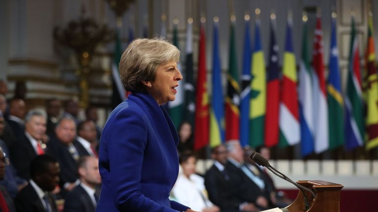 Britain&#39;s Prime Minister Theresa May speaks at the formal opening of the Commonwealth Heads of Government Meeting (CHOGM) at Buckingham Palace in London on April 19, 2018. - Queen Elizabeth II, the Head of the Commonwealth opened the Commonwealth summit for what may be the last time today. (Photo by Jonathan Brady / POOL / AFP) (Photo credit should read JONATHAN BRADY/AFP/Getty Images)