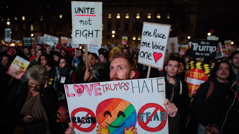 LONDON, ENGLAND - FEBRUARY 20: A protester holds up a placard during a rally in Parliament Square against US president Donald Trump&#39;s state visit to the UK on February 20, 2017 in London, England. MPs in the Houses of Parliament debate Mr Trump&#39;s state visit to the UK after a petition against it reached 1.8 million signatures. (Photo by Jack Taylor/Getty Images)
