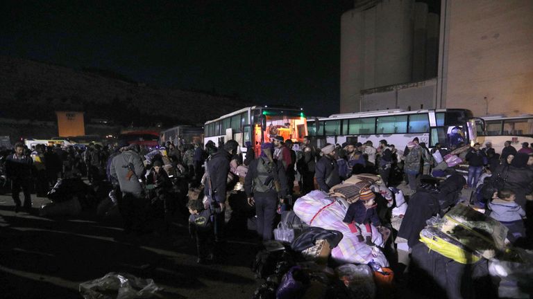 Thousands of Syria civilians have been bussed out of Eastern Ghouta