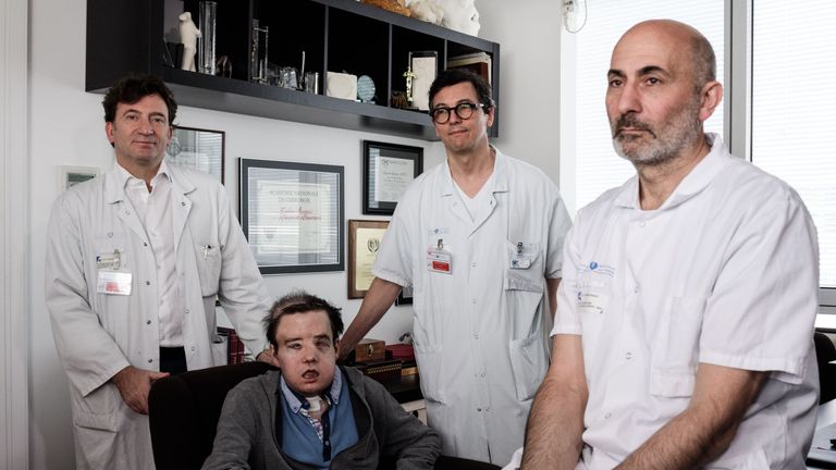 Plastic surgeon Laurent Lantieri (right) with members of his team and Jerome Hamon