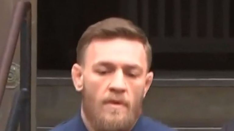 McGregor is taken from a police station to court in New York City
