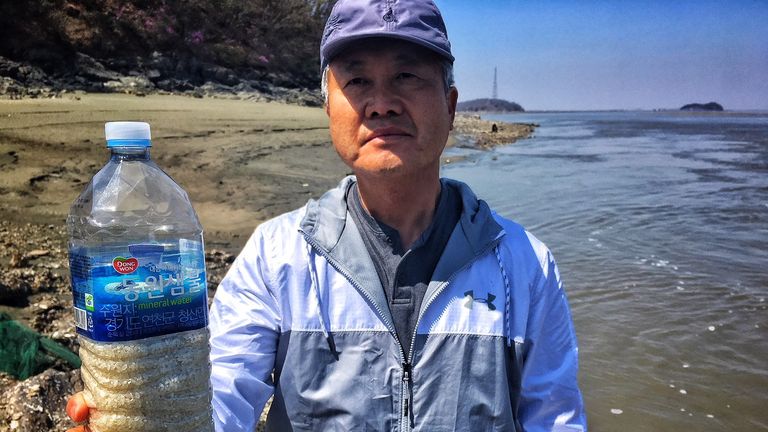 Defectors throw the bottles in the hope they will wash up in the North